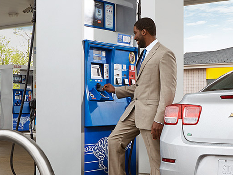 man at fuel pump